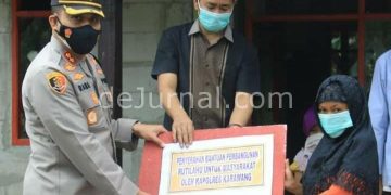 Kapolres Karawang Bagikan Sembako Dan Resmikan Rutilahu Serta Tinjau Desa Tangguh
