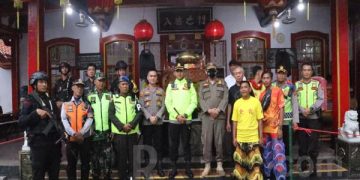 Polisi Monitoring Imlek 2023 Gunakan Sepeda Motor