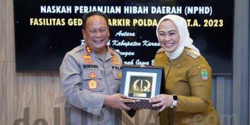 Penandatanganan Naskah Perjanjian Hibah Daerah (NPHD) Antara Pemerintah Kabupaten Karawang Dengan Polda Jabar