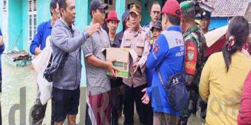 Kabid Humas Polda Jabar : Diguyur Hujan Selama Dua Hari Polisi Salurkan Bantuan Ke Lokasi Banjir
