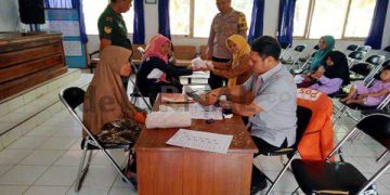 Polsek Ciamis Monitoring Penyaluran Bantuan Pangan Rawan Stunting Tingkat Kec. Baregbeg