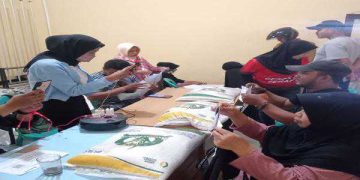 Pendistribusian Bantuan Pangan Nasional di Desa Lebak Agung Berlangsung Kondusif