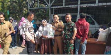 Pemdes Serang Mekar Salurkan Bansos Cadangan Pangan Berupa Beras 10 Kg
