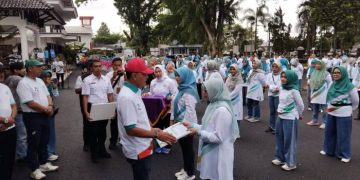 Peringati HKN ke-61, Bupati Herdiat Ajak Tenaga Medis Sehatkan Diri