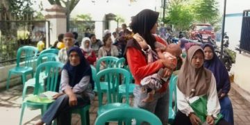 Distribusi Bansos Pangan di Sukabakti: 617 KPM Terima Beras dan Minyak untuk Jaga Ketahanan Ekonomi Warga