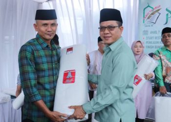 Untuk Mengingat Kematian Bupati Bandung Bagi-bagi Kain Kafan di Malam Tahun Baru Islam