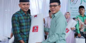 Untuk Mengingat Kematian Bupati Bandung Bagi-bagi Kain Kafan di Malam Tahun Baru Islam