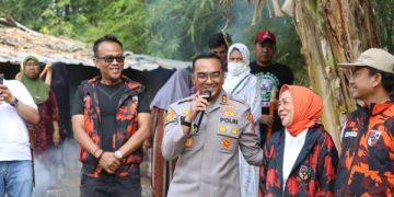 Kapolres Purwakarta Bersama Pemuda Pancasila, Bersihkan Sungai dan Tebar Benih Ikan